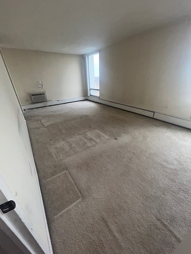 unfurnished room featuring carpet floors