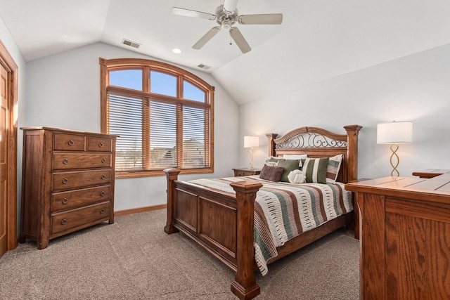 bedroom featuring vaulted ceiling, baseboards, visible vents, and light colored carpet