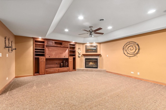 unfurnished living room featuring carpet floors, recessed lighting, visible vents, and baseboards