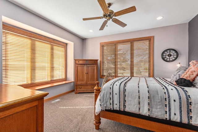 bedroom featuring ceiling fan, recessed lighting, light colored carpet, visible vents, and baseboards