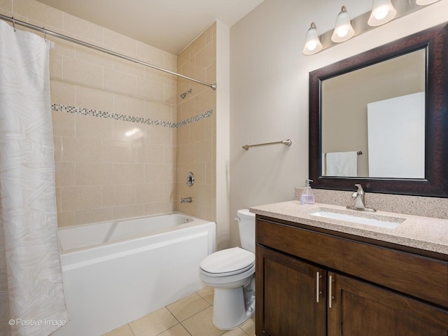 full bathroom with tile patterned floors, toilet, shower / bath combo, and vanity