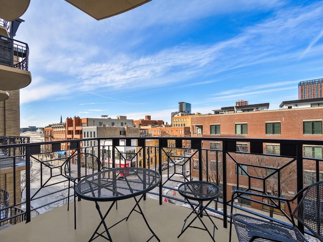 balcony featuring a view of city