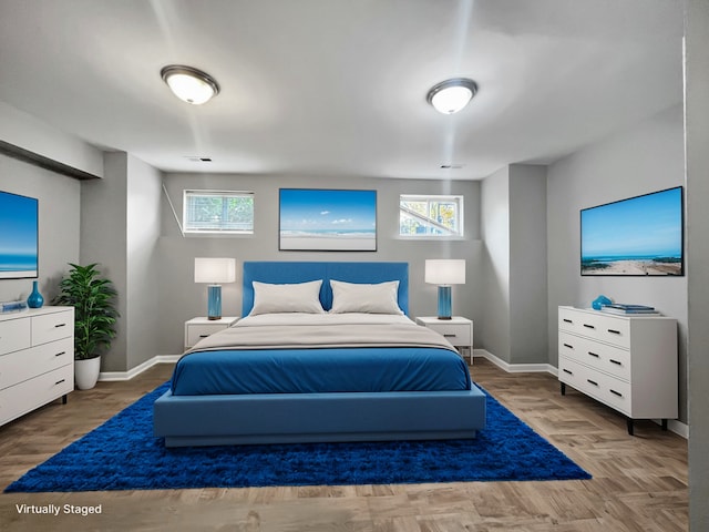 bedroom featuring baseboards