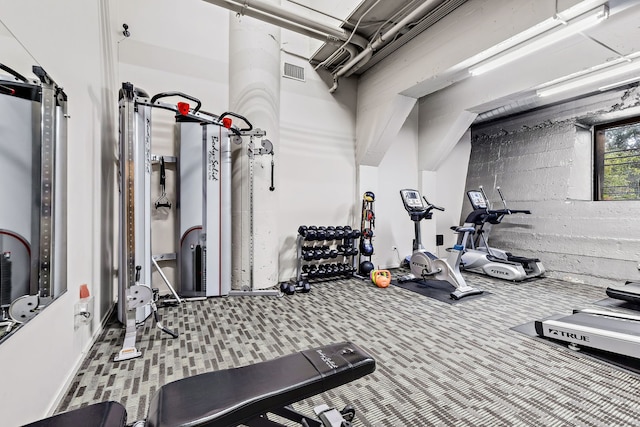 gym featuring visible vents and carpet flooring