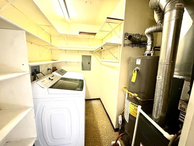 washroom with laundry area, electric panel, baseboards, washing machine and dryer, and gas water heater