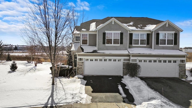 view of front of house featuring driveway and an attached garage