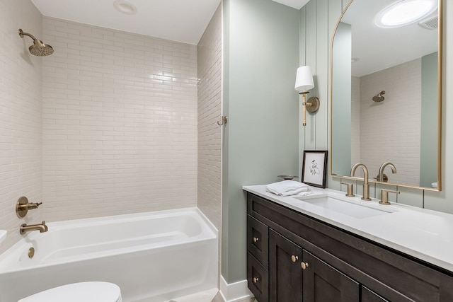 bathroom featuring visible vents, vanity, toilet, and shower / bathtub combination