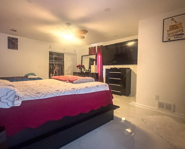 bedroom with a ceiling fan, a closet, and visible vents