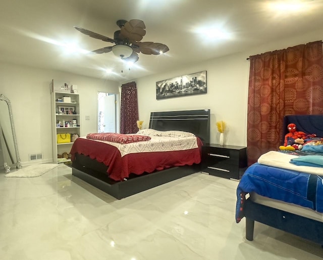 bedroom with a ceiling fan and visible vents