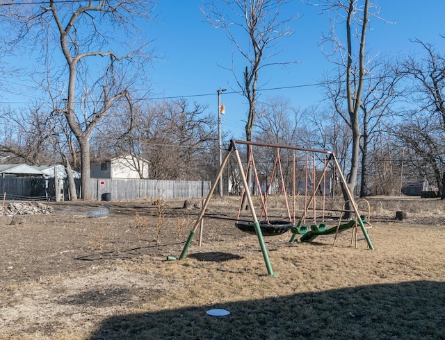 view of play area featuring fence