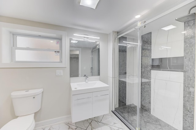 full bath featuring a stall shower, baseboards, toilet, marble finish floor, and vanity