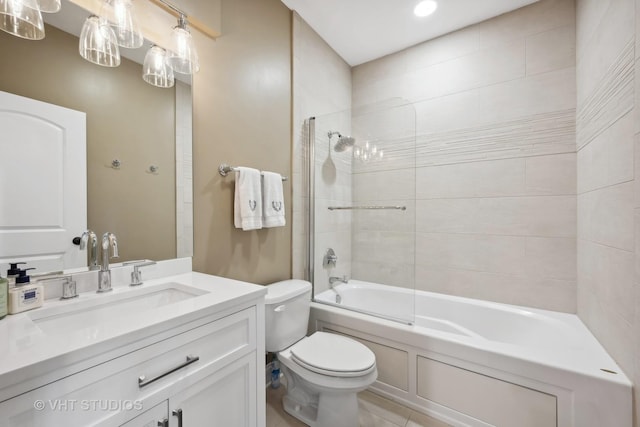 full bathroom featuring toilet, vanity, and bathing tub / shower combination