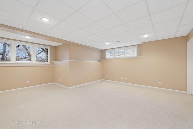 basement with recessed lighting, carpet, a drop ceiling, and baseboards