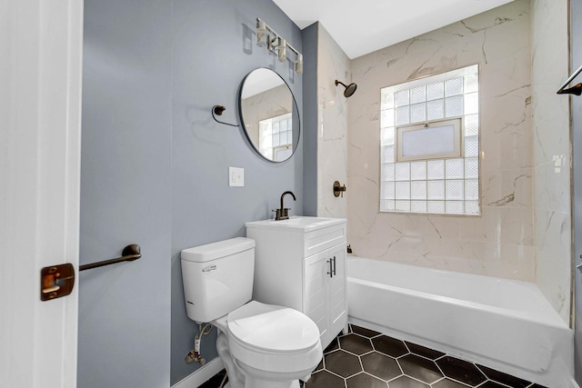 full bath with shower / washtub combination, vanity, toilet, and tile patterned floors