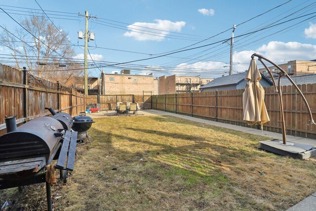 view of yard featuring a fenced backyard