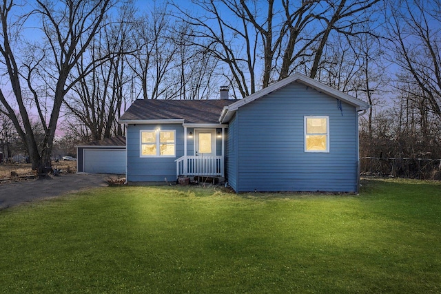 single story home with a garage, a front lawn, a chimney, and fence