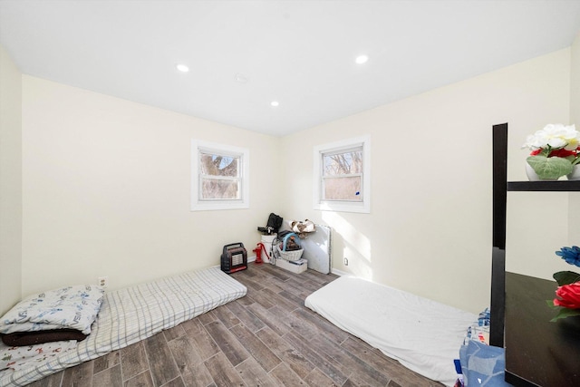 bedroom featuring recessed lighting and wood finished floors