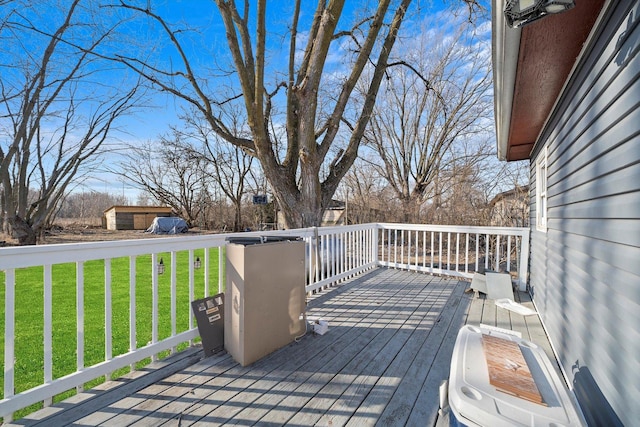 deck featuring a lawn