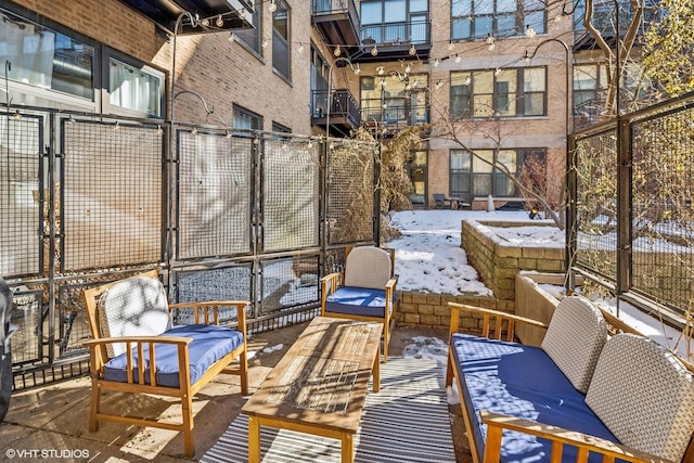 view of snow covered patio