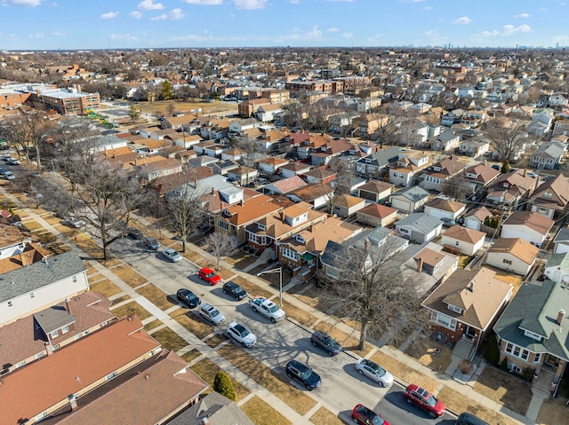 birds eye view of property with a residential view