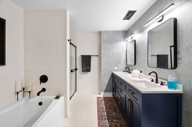 full bath with a garden tub, visible vents, a sink, and tile patterned floors