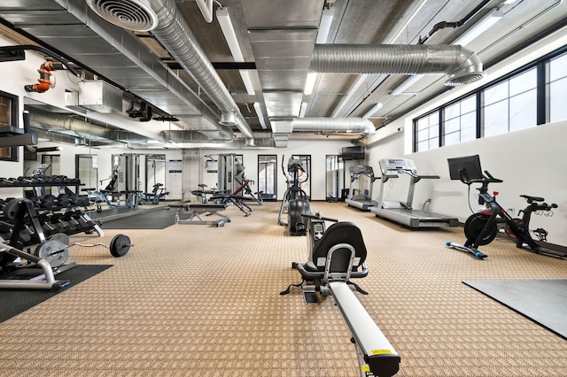 exercise room featuring visible vents