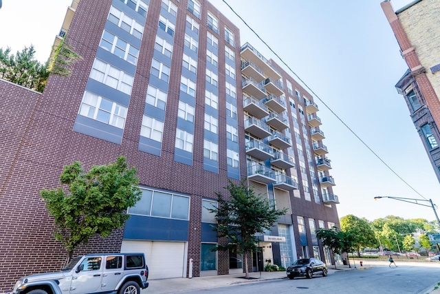 view of building exterior featuring an attached garage