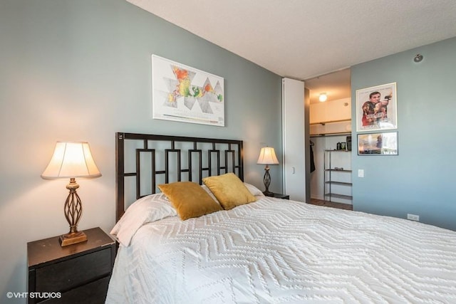 bedroom with a closet and a spacious closet