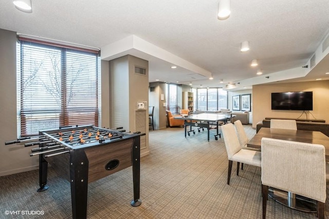 game room featuring carpet, visible vents, and baseboards