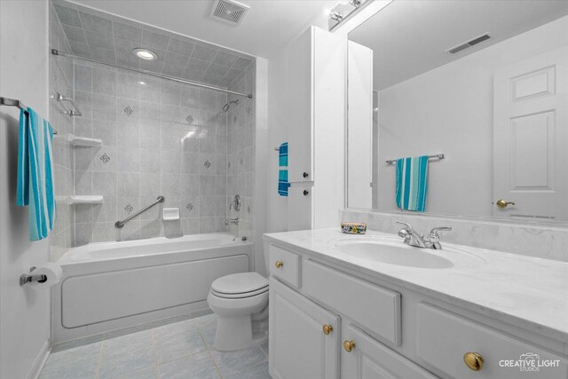 420 W Burlington Ave Unit 303, La Grange, IL 60525 - full bath featuring bathing tub / shower combination, toilet, vanity, and tile patterned floors