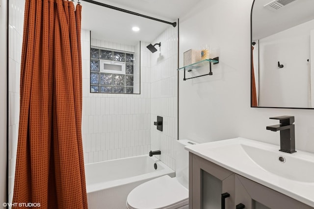 full bathroom with vanity, shower / bath combination with curtain, toilet, and visible vents