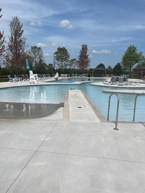 community pool with a patio