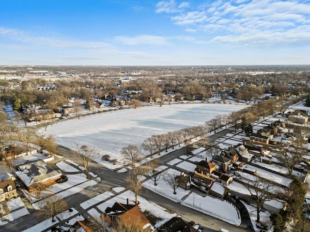 snowy aerial view featuring a residential view