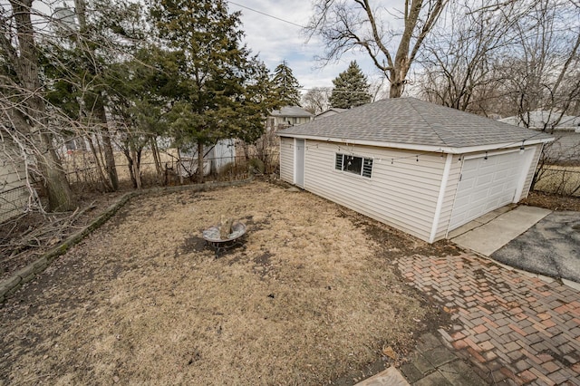 detached garage with fence