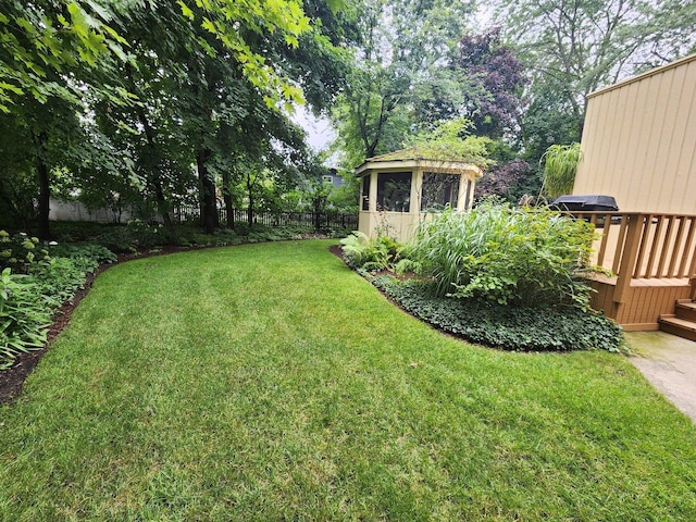 view of yard with a deck