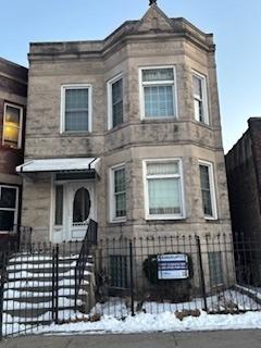 view of front facade with stone siding