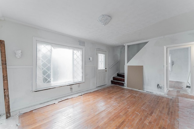 interior space featuring stairs and light wood-style flooring