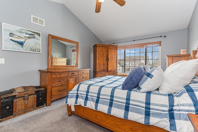 bedroom with light carpet, ceiling fan, lofted ceiling, and visible vents