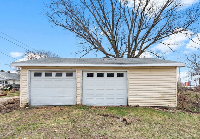 detached garage with fence