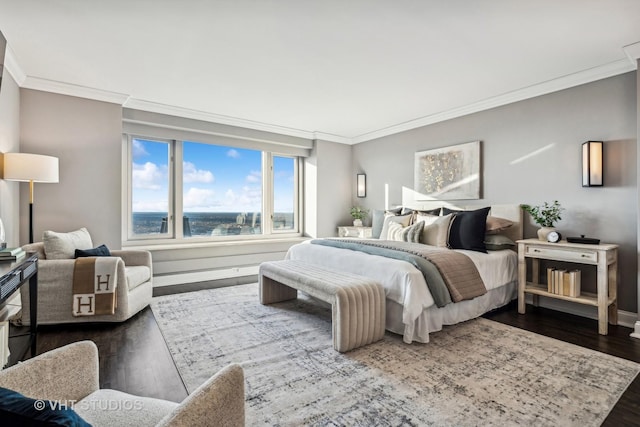 bedroom featuring a water view, crown molding, baseboards, and dark wood-style flooring