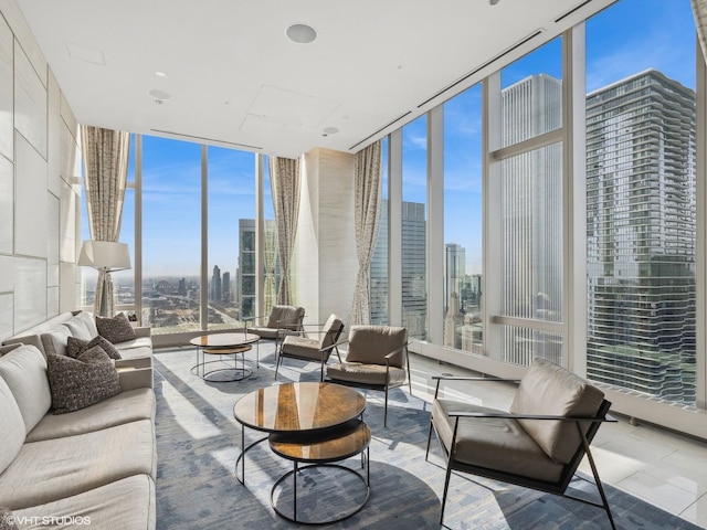 sunroom featuring a view of city