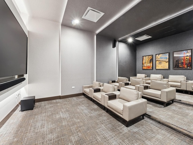 carpeted cinema room with recessed lighting, visible vents, and baseboards