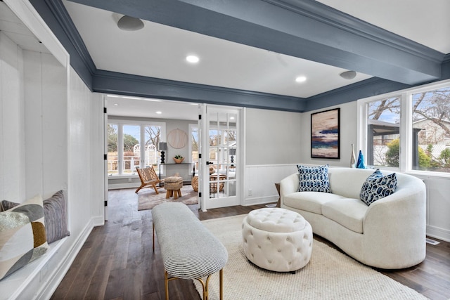 living area featuring recessed lighting, dark wood-type flooring, french doors, wainscoting, and crown molding