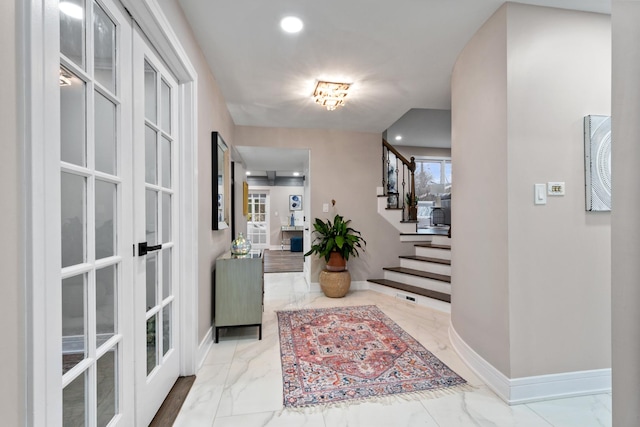 entrance foyer featuring stairs, marble finish floor, recessed lighting, and baseboards