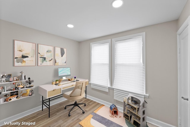 home office with baseboards, recessed lighting, and light wood-style floors