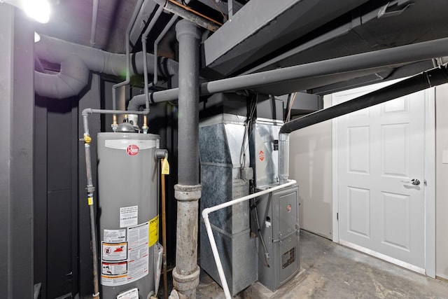 utility room featuring gas water heater