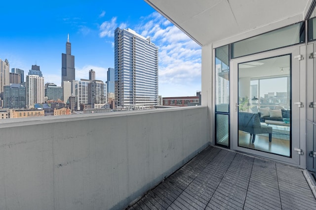 balcony featuring a city view