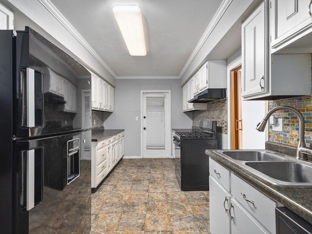 kitchen featuring dark countertops, white cabinetry, a sink, under cabinet range hood, and black appliances