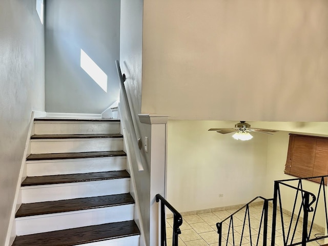 9310 S Eggleston Ave, Chicago, IL 60620 - stairs with a ceiling fan and tile patterned flooring