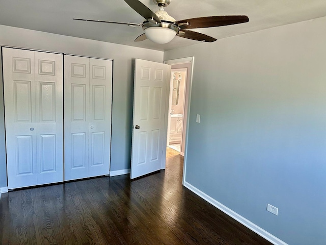 9310 S Eggleston Ave, Chicago, IL 60620 - unfurnished bedroom with a ceiling fan, baseboards, a closet, and dark wood finished floors